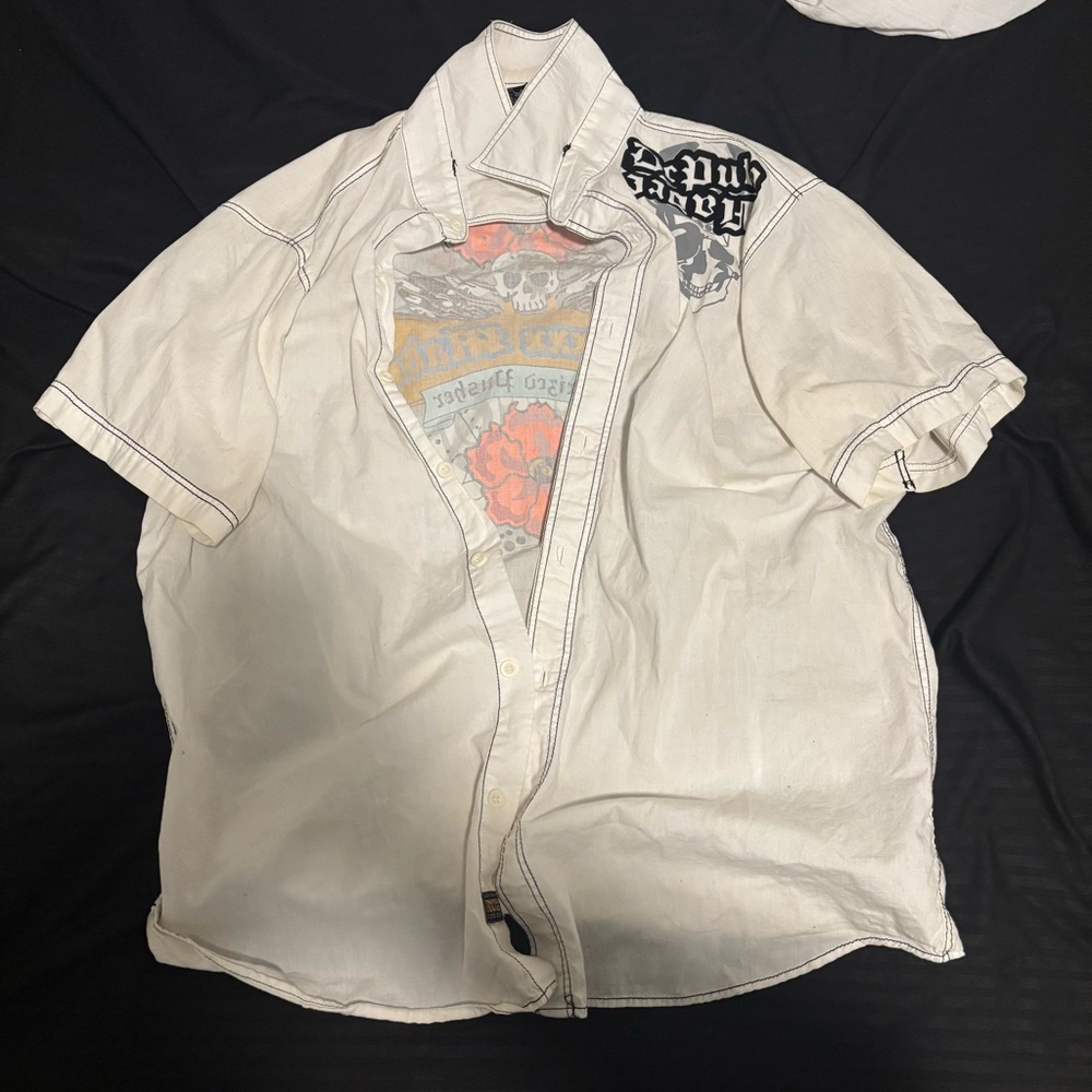 Cle de Peau White Short Sleeve Shirt with Black Accents